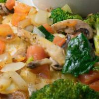 Veggie Omelette · Spinach, button mushrooms, broccoli, bell peppers, onions, and tomatoes made with egg whites...