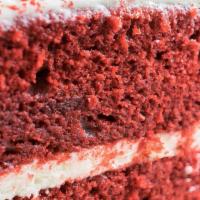 Red Velvet Cake · Two layers of our rich Red Velvet Cake, separated and topped with our Cream Cheese Icing and...