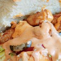 Chicken Salad Po-Boy Sandwich · Chicken salad mixed with celery, carrots, homemade served with provolone cheese, and dill pi...