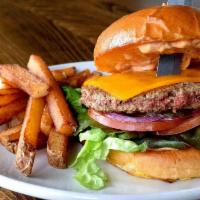 Beyond Burger · Grilled plant based protein burger prepared on a toasted brioche bun spread with Thousand Is...