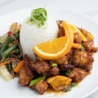 Szechaun Orange Chicken · Tempura fried chicken tossed in soy orange glaze with garlic, ginger, dried chilies, green o...