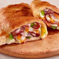 Ham & Cheese · Cal. 160/Slice. A flaky, oven-baked golden crust stuffed with a bountiful blend of hearty in...