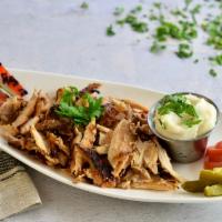 Chicken  Shawarma · Boneless Chicken, Marinated In Vinegar, Yogurt, House Spices, Ground Cardamom & Served With ...