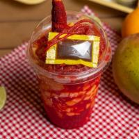 Mangonada · House Favorite Dessert, or snack! Liquid Chamoy around the inside of the cup, filled with Ma...