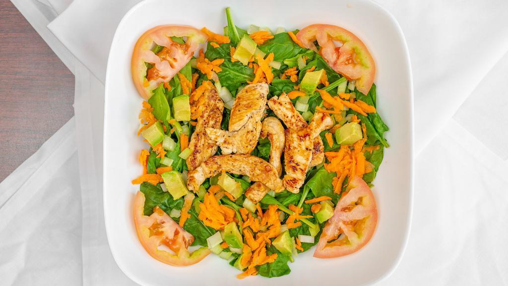 Spinach Salad · Spinach, tomato, carrots, celery, topped with cheese cubes and avocado slices