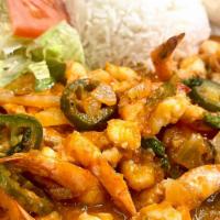 Shrimp Ranchero (12) · Mexican style Spicy Shrimp Dish.
12 Shrimps with Onion, Jalapeño, Cilantro.
Served with Lett...