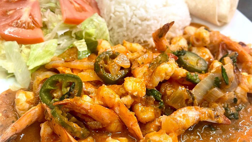 Shrimp Ranchero (12) · Mexican style Spicy Shrimp Dish.
12 Shrimps with Onion, Jalapeño, Cilantro.
Served with Lettuce/Tomato, Rice, Tortilla.