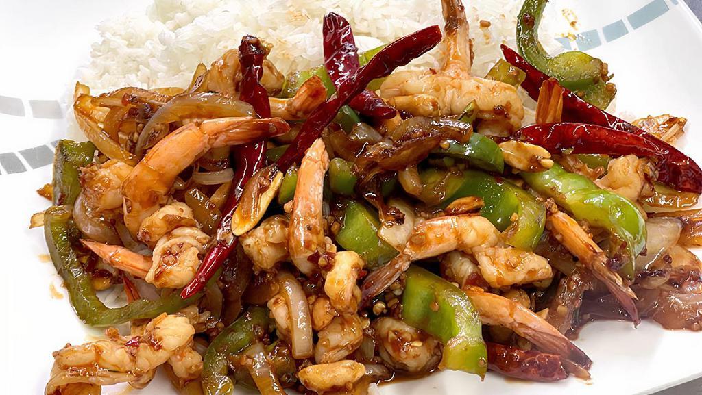 Kung Pao Shrimp · Stir Fried 12 Shrimps with Veggies, Dried Pepper, Peanuts over White Rice.
