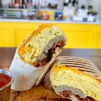 Breakfast Wrap · Scrambled eggs, sausage, bacon, and Cheddar.