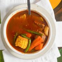 Caldo De Res · A traditional Oaxacan stew of beef and vegetables and side of rice.