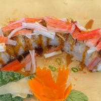 Crazy Crunch Roll · Shrimp tempura, avocado, jalapeno, crab meat, orange caviar, scallions & Chef’s special sauce
