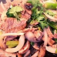 Sizzling Plate · Choice of meat stir-fried with mushrooms, onions, and broccoli served on a hot plate.