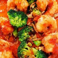 Jumping Shrimp · Stir-fried shrimp with zucchini, tomatoes, onions, and mushrooms in hot and sour sauce.