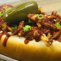 Bbq Dog · Jalapeño slaw, BBQ sauce, crispy onions, pickled jalapeño