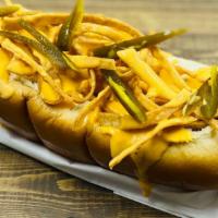 Nacho Dog · Queso sauce, tortilla chips, pickled jalapeños.