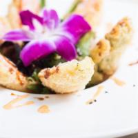 Stuffed Jalapenos · Half jalapenos stuffed with cream cheese and crab mix then tempura fried, served with spicy ...