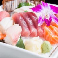 Sushi & Sashimi Combo · Five pieces of sushi, 10 pieces of sashimi.