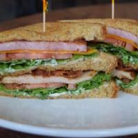 The Club · toasted double decker sandwich with ham, turkey, bacon, mayo, lettuce, tomato and your choic...
