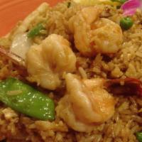 Lunch Pineapple Fried Rice · Large shrimp and chicken, carrots, onions, egg, green peas, raisins, snow peas, pineapple, a...