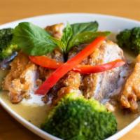Lunch Green Curry · Bamboo shoots, eggplant, basil leaf, and green peppers in hot coconut milk sauce. Medium spi...