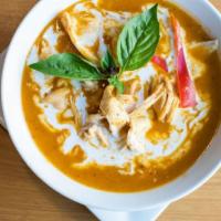 Panang Curry · Spicy. Thai eggplants, bamboo shoots, kaffir lime leaves, coconut milk.