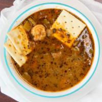 Small House Gumbo (16Oz) · Spicy. Made in-house with Chicken, Andouille Sausage & shrimps