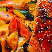 Hibachi Salmon · Served with broccoli, onion, carrot, zucchini, mushrooms, and a choice of side.