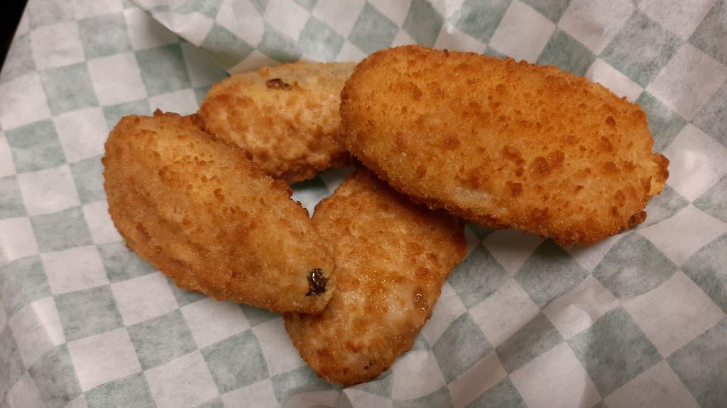 Jalapeno Poppers · Breaded & stuffed with cream cheese.
