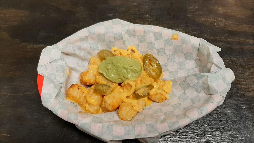 Loaded Tots · Large portion of crispy, crunchy tater tots. Covered in cheese and jalapenos and guacamole.