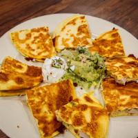 Quesadillas Especiales · Choose from Pollo a la Parrilla, Carne Asada, or Al Pastor. Served with Guacamole and Sour C...