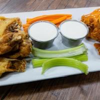 Traditional Wings 12 · Served with carrots and celery and ranch dressing. Choose sauce from Buffalo Sauce, Lemon Pe...
