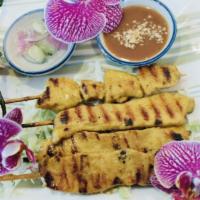 1. Chicken  Satay (4 Pieces) · Your choice of grilled chicken marinated in satay sauce on bamboo skewers. Served with peanu...