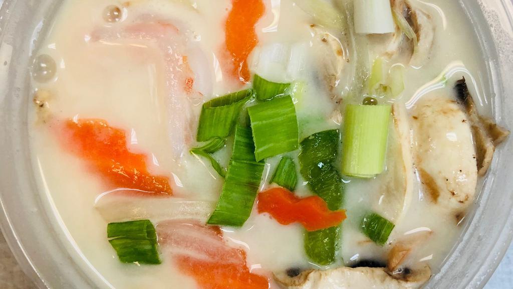Tom-Kha Soup (Small) · Rich, creamy coconut soup with mushrooms, and carrots.