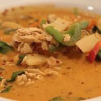 Red Curry · Spicy. Your choice of meat cooked in coconut milk, red curry sauce with bamboo shoots, eggpl...