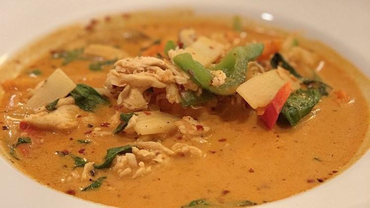 Red Curry · Spicy. Your choice of meat cooked in coconut milk, red curry sauce with bamboo shoots, eggplants, bell peppers and basil leaves.