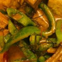 Panang Curry · Spicy. Your choice of meat cooked in coconut milk, panang curry sauce with bell peppers.
