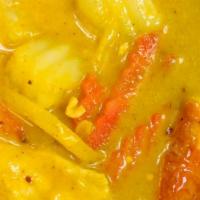 Yellow Curry · Your choice of meat, cooked in yellow curry sauce with tomatoes, onions and potatoes.