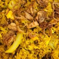 Yellow Curry Fried Rice · With eggs, tomatoes, and onions with yellow curry paste.