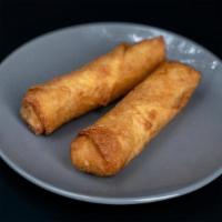 2 Large Egg Rolls · Two large savory egg rolls with shredded cabbage, ground pork, and spices then fried to perf...