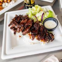 Beef Teriyaki Meal · Over a half pound of marinated skirt steak, grilled to perfection. Covered in fresh teriyaki...