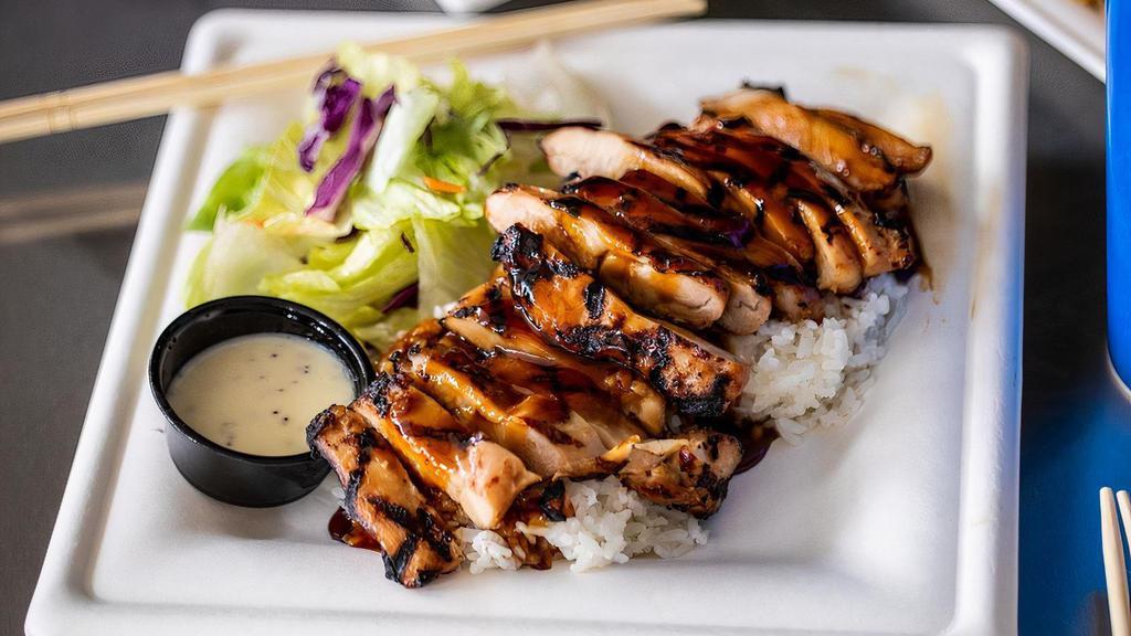Chicken Teriyaki Meal · Over a half pound of marinated chicken, grilled to perfection. Covered in fresh teriyaki sauce and served over a bed of rice with a simple side salad.