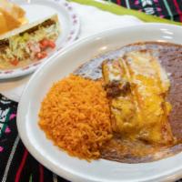 Deluxe Dinner · Crispy ground beef taco, chile con queso puff, one cheese enchilada, one tamale, covered wit...
