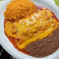 Chicken Enchiladas · Two shredded chicken enchiladas covered with ranchera sauce, topped with cheese. Served with...