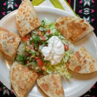 Veggie Quesadillas · 3 Quesadillas with melted mexican white cheese sandwiched between a flour tortilla. Served w...