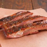 Pork Ribs · Price per half pound. Tender with just enough bite. A full, smoked rack averages three and a...