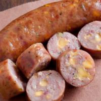 Jalapeño Cheddar Sausage · Price per half pound. A blend of premium beef and pork mixed with fresh jalapeños and real c...