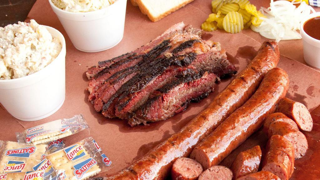 Family Meal #1 - Feeds 5 · Feeds five. This meal includes one and a half pounds sausage and one pound brisket with your choice of two sides (pints). Complimentary pickles, onions, bread, crackers and BBQ sauce included.