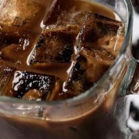 Iced Coffee · Refreshing cold coffee sweetended with pure cane light on cream