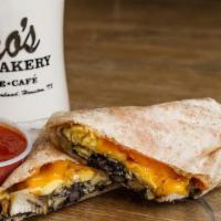 Black Bean Grilled Chicken Wrap · Black beans, eggs, grilled chicken and cheese all wrapped up in a wheat tortilla.