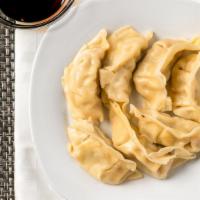 Dumplings ( Steamed Or Fried) · Chicken, vegetable served with ginger sauce. 8 pieces.